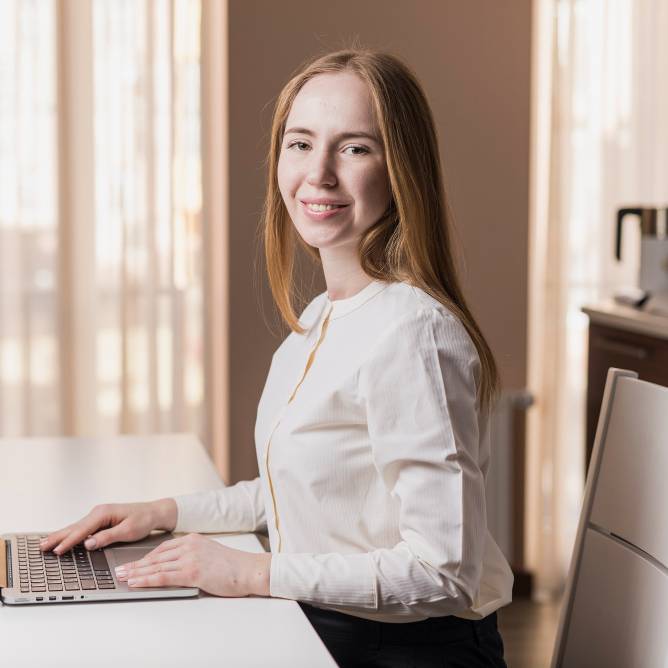 Stylish happy girl with laptop